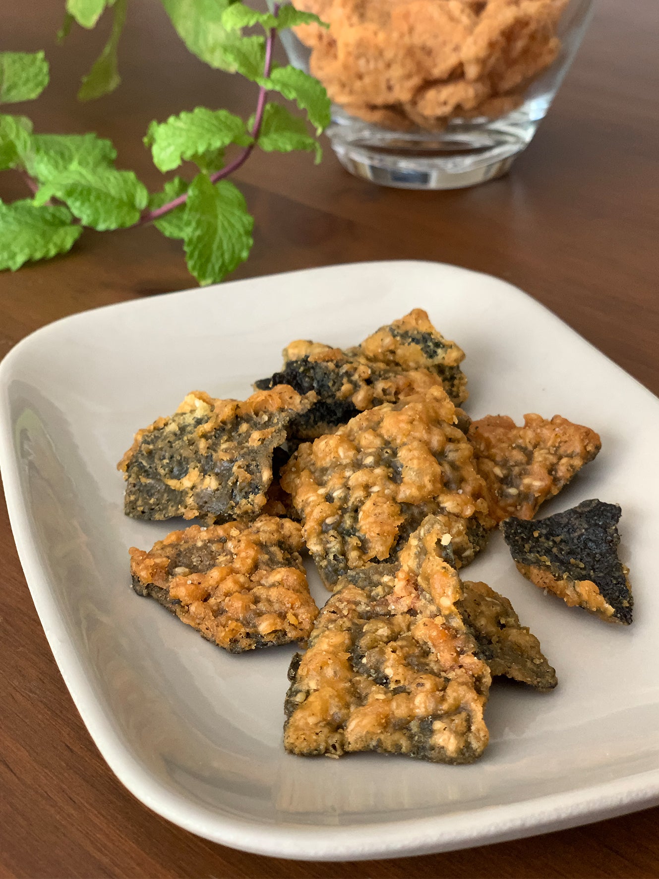 tempura seaweed on plate set on kitchen counter